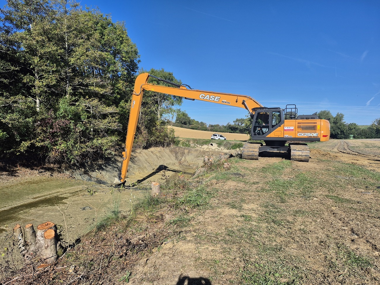 Location pelle bras long 18 M ou long reach